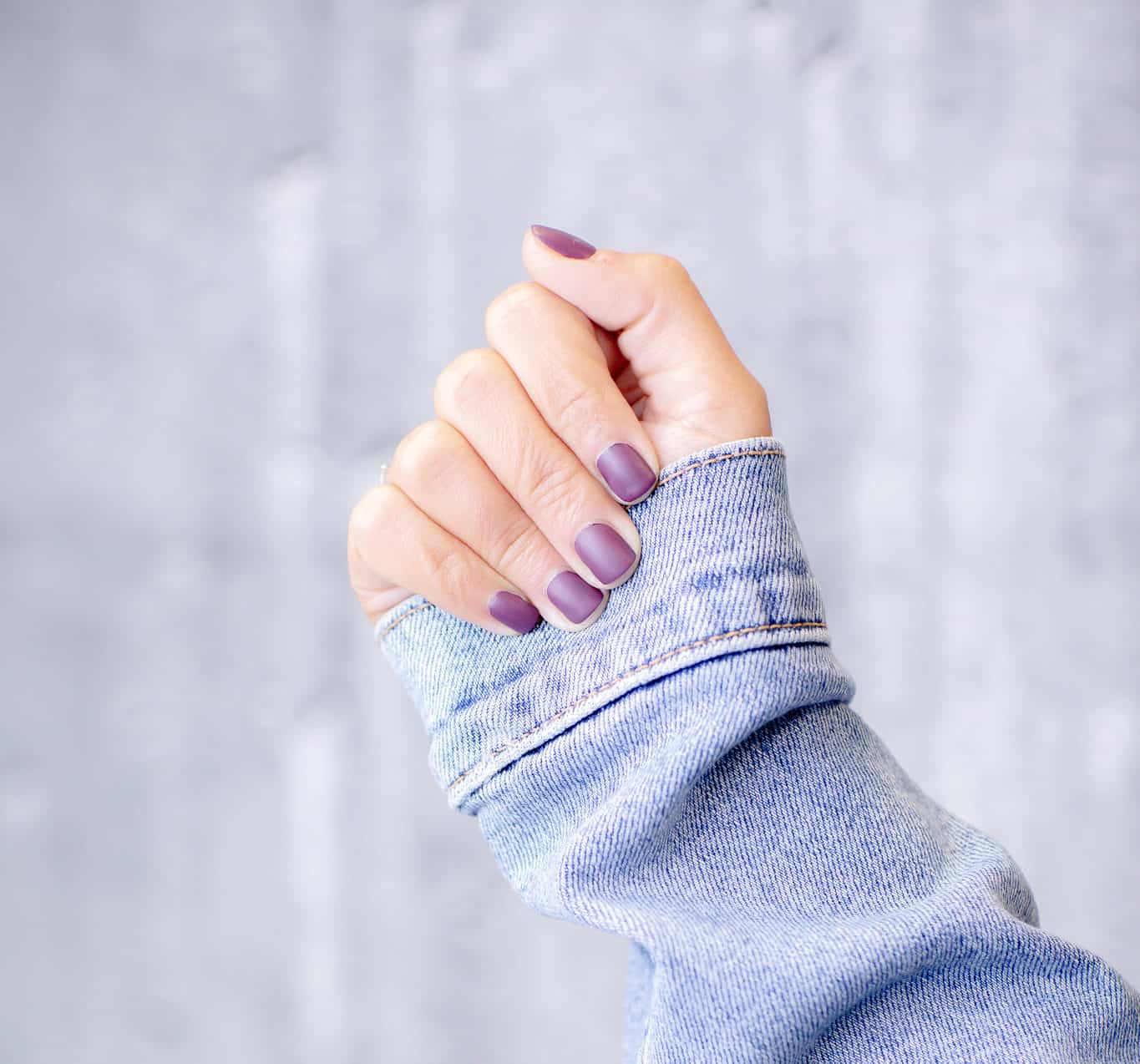 Natural nail shape with purple mani